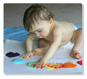 Baby Playing with Edible Painting